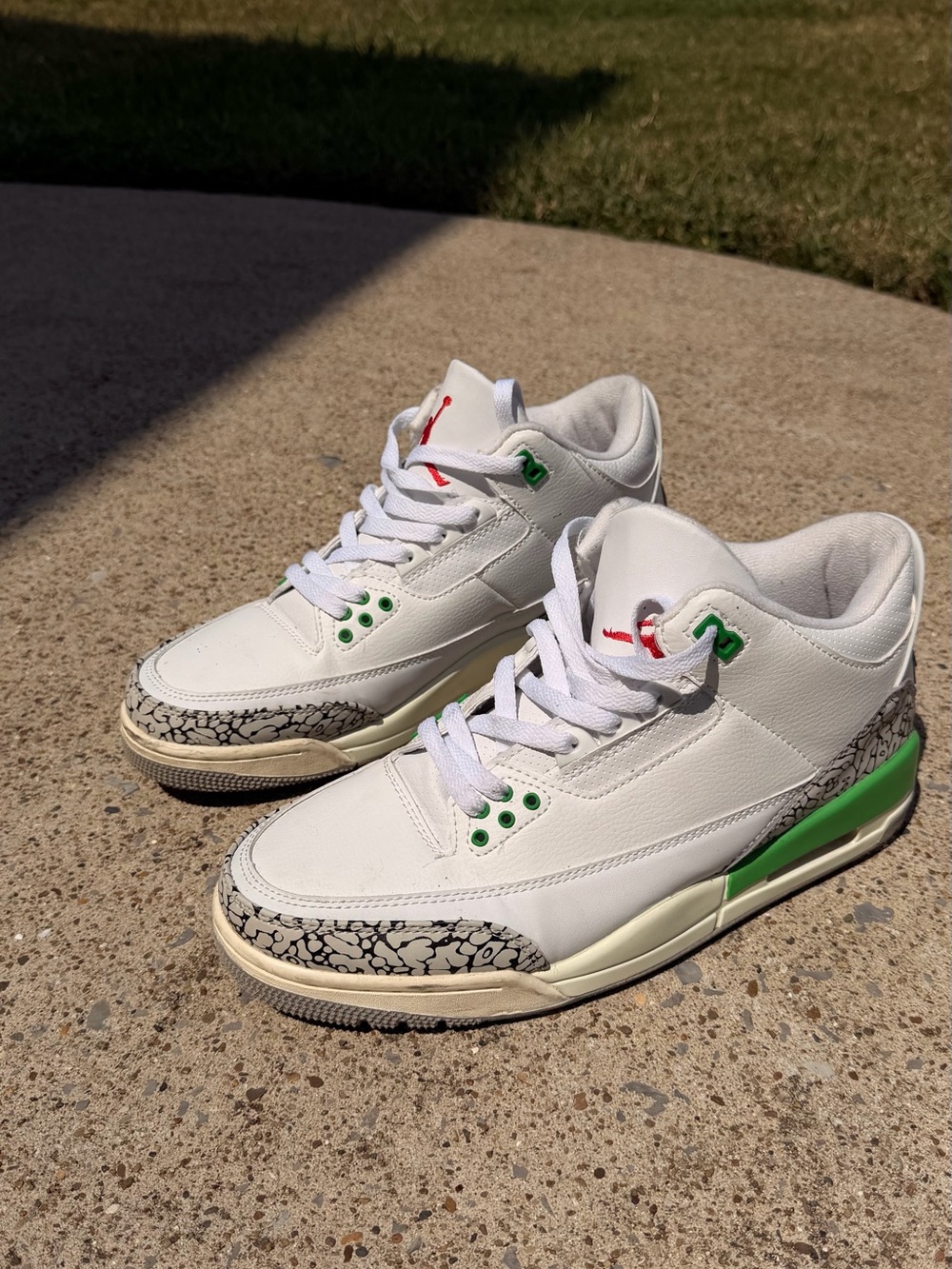 Jordan Kids White Sneakers with Green and Red Accents